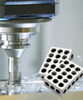 Angled view of a pair of 1x2x3 inch steel parallel blocks with 23 threaded holes