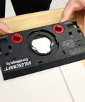 Concealed Cabinet Hinge Jig With 35 Mm Forstner Bit And Metal Bushing Drill Guide showing edge alignment features on a table.