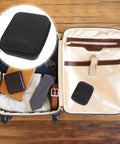 Heavy Duty Hard Shell Tech Carry Pouch For Chargers Power Banks Cables And Earbuds With Water Resistant Cover in suitcase.
