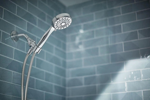 Ignite Chrome Handheld Shower System With Modern Sleek Design And Mirror Like Finish in a contemporary bathroom setting