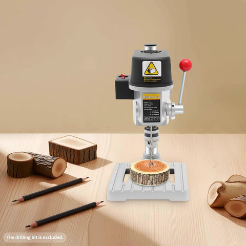 Powerful 340W Benchtop Drill Press With 3 Speed Corded Mini Drill For DIY Metal And Plastic Projects on wood with logs.