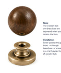 The Real Deal Natural Walnut And Antique Brass Cabinet Knobs Six Pack Hella Sturdy Round Ball Handles For Kitchen Drawers - Solid walnut knob with brass base.