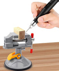 Person using Dope Mini Drill Press Vise With Suction Cup 360 Degree Rotating Walnut Clamp Adjustable Jaw Vise for woodworking on table.