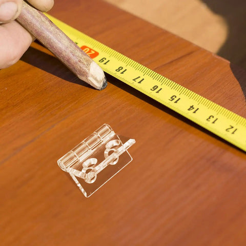 Frosted Acrylic Cabinet Hinge With Pre Drilled Holes for easy install, shown with measuring tape and pencil on wood surface