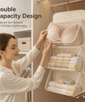 Woman organizing bras in Pink Mesh Storage Hanging Bag With 360 Swivel Hook and Expandable Double Layer Closet Organizer.