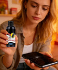 Woman holding Screen Repair Liquid No Fuss Quick Fix For Phones Tablets And Eyeglasses That Restores Scratches And Smoothes Glass And Improves Display For Beginners Tech Enthusiasts And Hobbyists next to a cracked phone screen.