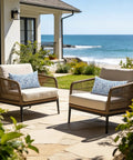 Outdoor Lumbar Pillow Covers 12x20 Inches Pack Of 2 Covers Only Fade Resistant Polyester Cushion Cases For Patio Balcony Garden All Weather Use Pebble Blue on patio chairs overlooking ocean.