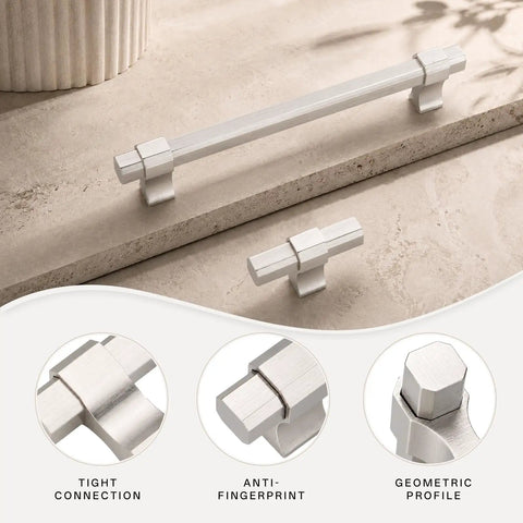 10 Pack Brushed Nickel Single Hole Kitchen Cabinet Knobs Fingerprint Resistant Coating Keeps Smudges at Bay Silky Smooth Anodized Aluminum Rust Free 2.36 Inch geometric cabinet hardware on a countertop.