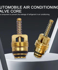 Close-up of two brass valve cores on a white surface, part of 7 Piece Car AC Valve Core Kit With Caps And Seals For DIY No Fuss Friendly AC System Repair