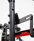 Close-up of a Freestanding Four Bike Storage Rack With Adjustable Gravity Hanger showing the bracket and bike mount.