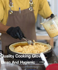 Chef wearing Textured Nitrile Exam Gloves Latex Free And Powder Free 5 Mil Non Sterile Disposable Gloves adding cheese to pan.