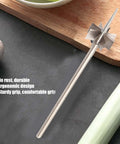 Side view of stainless steel onion/scallion cutter with plum-blossom multi-blade head and long handle.