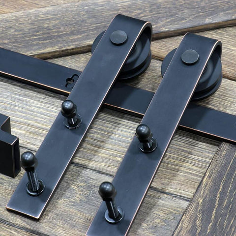 Oil Rubbed Bronze Sliding Barn Door Hardware Kit With J-Shape Rollers for Interior Doors Brushed Antique Bronze Finish close-up view.