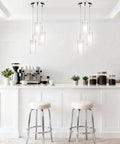 Modern Chrome Pendant Light With Clear Glass Cylinder And Frosted Inner Shade, 1 Light Hanging Fixture in a kitchen setting