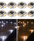8 Pack Solar Driveway Lights Outdoor With Dual Color Modes Warm White And Cool White Waterproof LED Marker Lights For Steps Sidewalks Garden Pathway Walkways Deck And Dock displayed on a pathway in both cool and warm light modes.