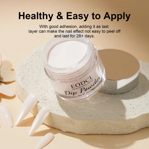 Milk White Nail Dip Powder in 1 oz jar, on textured surface with nail tips, for easy at-home French manicure.
