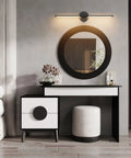 Set Of Two 28 Inch Black Linear Wall Sconce Hardwired 3000K Warm Led Light Fixture 360 Degree Swivel above a modern vanity.