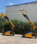 Electric Glass Vacuum Lifter Robot for smooth steel and stone panel handling in bright yellow and black design outdoors.