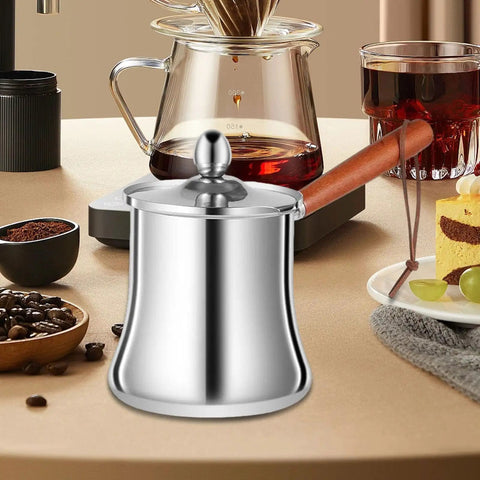 Stainless Steel Turkish Coffee Pot And Melt Pan For Butter Sauces And Frothing Milk 720ml displayed on kitchen counter