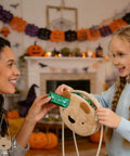 Child using Little Bear DIY Sewing Kit For Beginners Arts And Crafts Plush Crossbody Bag with mother in Halloween setting