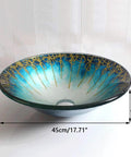 USZWBY Gradient Color Artistic Vessel Sink Bowl-Shaped Tempered Glass Above Counter Bathroom Washing Basin Combo with Waterfall Faucet, Modern Lavatory Bowl, 17.71", Gold showing blue and gold gradient design.