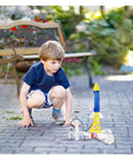 Child launching Water Powered Rocket Kit For Outdoor STEM Learning DIY Bottle Rocket With Tail Body And Pump Launcher Included Easy To Build Space Science Project For Kids Teens Boys And Girls Totally Kid Friendly Fun in backyard