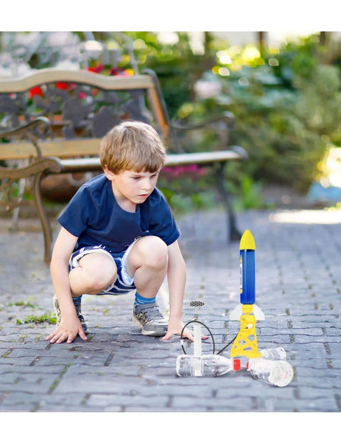 Child launching Water Powered Rocket Kit For Outdoor STEM Learning DIY Bottle Rocket With Tail Body And Pump Launcher Included Easy To Build Space Science Project For Kids Teens Boys And Girls Totally Kid Friendly Fun in backyard