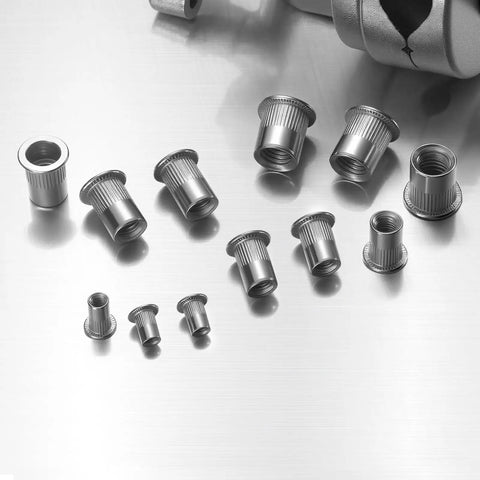 60Pcs M6 Stainless Steel Rivet Nuts Kit Flat Head Rivnut Threaded Inserts Nutsert Rivet Nut With Knurled Body For Metal Auto Home Projects And Industrial Use Heavy Duty Fasteners displayed on a metallic surface