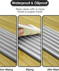 Slick Baby Edge Guard And Corner Protector With Heavy Duty NBR Foam No Sweat PreTaped Adhesive For Foolproof Setup Soft Dense Toddler Proof Padding Solid Child Safe Nursery Essentials In Extra Wide Dimensions shown being wiped clean.