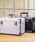 Heavy Duty Aluminum Tool Organizer Case With Weather And Dent Resistant Build Double Key Lock on wooden surface