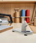 Heavy Duty Plastic Glue Stick Organizer Stand With Deep Trenches For Hot Melt Adhesive Pens on a craft workspace.