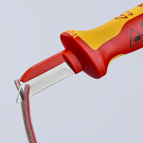 1,000V Insulated Cable Knife With Solid Fixed Blade cutting a wire, showing plastic coated back and slip guard handle, red color