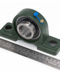 Two Pack Pillow Block Mounted Ball Bearings UCP20721 Bore One And Five Sixteenths Inches Cast Iron Housing With Rust Resistant Paint Self Aligning Chrome Steel Sealed Bearings Easy Install Durable Shaft Alignment Low Maintenance Cost Saving, green pillow block bearing with ruler