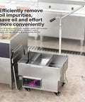 Built Tough Commercial Fryer Oil Filter Machine With Five Layer Stainless Steel Cartridge And Quick Automatic Return Flow For Real Restaurant Hustle Straight Up 10 Gallon Size with opened lid in a kitchen setting.