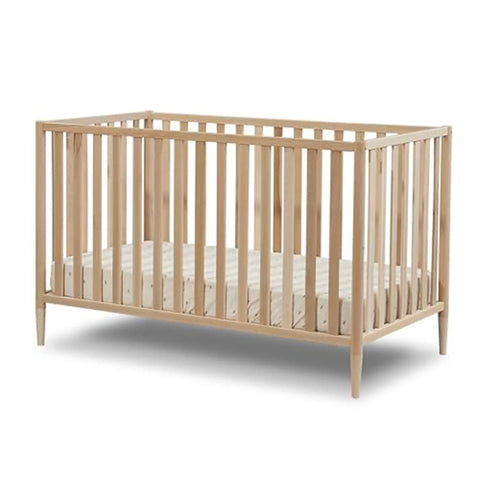 Mia Toddler Rail For Convertible Crib In Natural Wood Safe Transition Guardrail JPMA Certified shown on crib base, no tools required