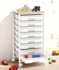 Rolling Cart With Eight Drawers Wooden Tabletop Storage Cart On Lockable Wheels in a children's playroom with toys