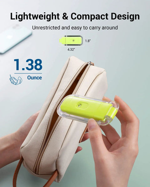 Green Go-To Clip On Book Light For Reading At Night with amber glow shown next to a small pouch demonstrating compact size.