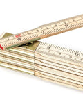 Close-up of Foldable Wood Ruler 6 Ft 6 In With US And Metric Measurements showing inch and metric scales on wood sections.