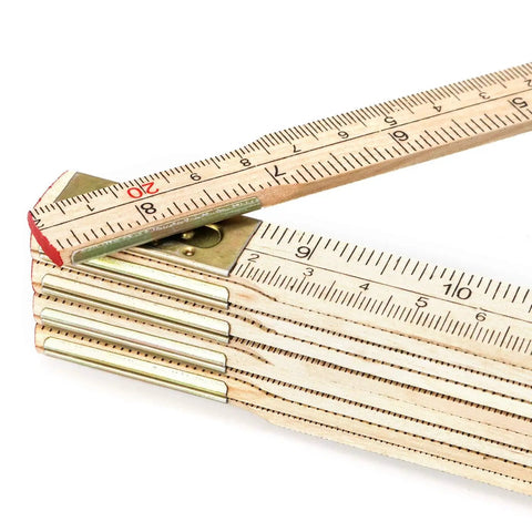 Close-up of Foldable Wood Ruler 6 Ft 6 In With US And Metric Measurements showing inch and metric scales on wood sections.