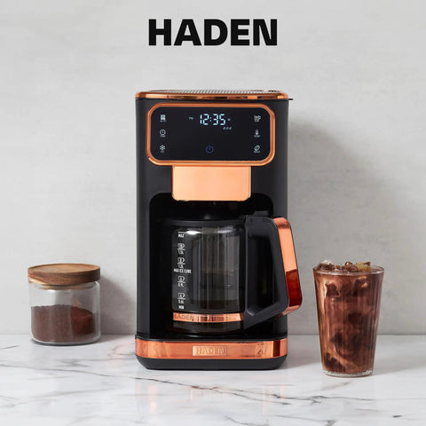 Heavy Duty 12 Cup Dual Brew Coffee Maker Built For Hot And Cold Brewing Keep Warm Plate Delay Timer And Adjustable Strength For Seriously Smooth Daily Sips In Sleek Black with glass of iced coffee