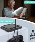 Lighted Magnifying Glass With Stand For Reading And Crafts Large 9 By 6 Inch Viewing Area 48 Ultra Bright LEDs 360 Degree Gooseneck Hands Free Magnifier For Close Work, showing hands-free use.