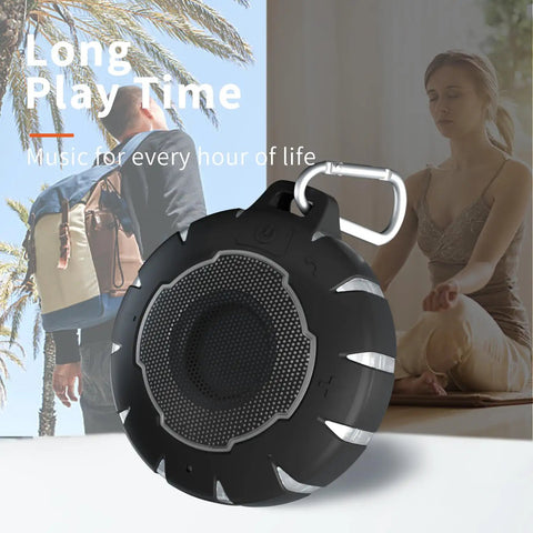 Waterproof Shower Bluetooth Speaker With IPX7 Rating and carabiner clip for outdoor adventures, featuring long play time.