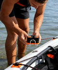 Man installing Quick Release Rope Clamp For Kayak Rigging And Marine Gear With Auto Locking Cam Cleat One Hand Tensioning Tool
