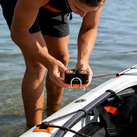 Man installing Quick Release Rope Clamp For Kayak Rigging And Marine Gear With Auto Locking Cam Cleat One Hand Tensioning Tool