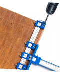 Straight Shot Precision Adjustable Woodworking Jig For Cabinet Hardware Portable Hole Punch Locator on wood with drill.