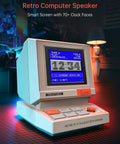 Mini Retro PC Style Speaker with pixel screen displaying clock, beige, for bedroom office and gaming; desk setup view.