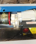 Close-up of the motor and cable system of the Compact Cargo Elevator Smooth Freight Lift for heavy-duty use.
