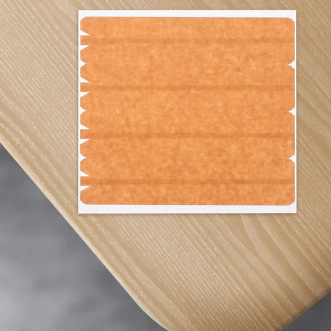 Beefy Heavy Duty Packing Tape for Cardboard Boxes with High Adhesion and Easy Tear Strip on wooden table