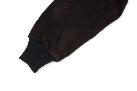 Close-up of a black leather sleeve from a DVALIN Hybrid FR Leather Welding Jacket with ribbed cuff for maximum spark and heat protection.