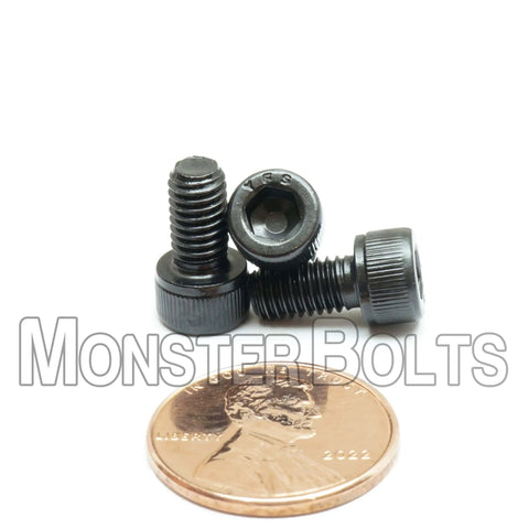 Beefy 10-32 Socket Head Cap Screws Three-Eighths Inch Alloy Steel Black Oxide Finish ASTM A574 with penny for scale